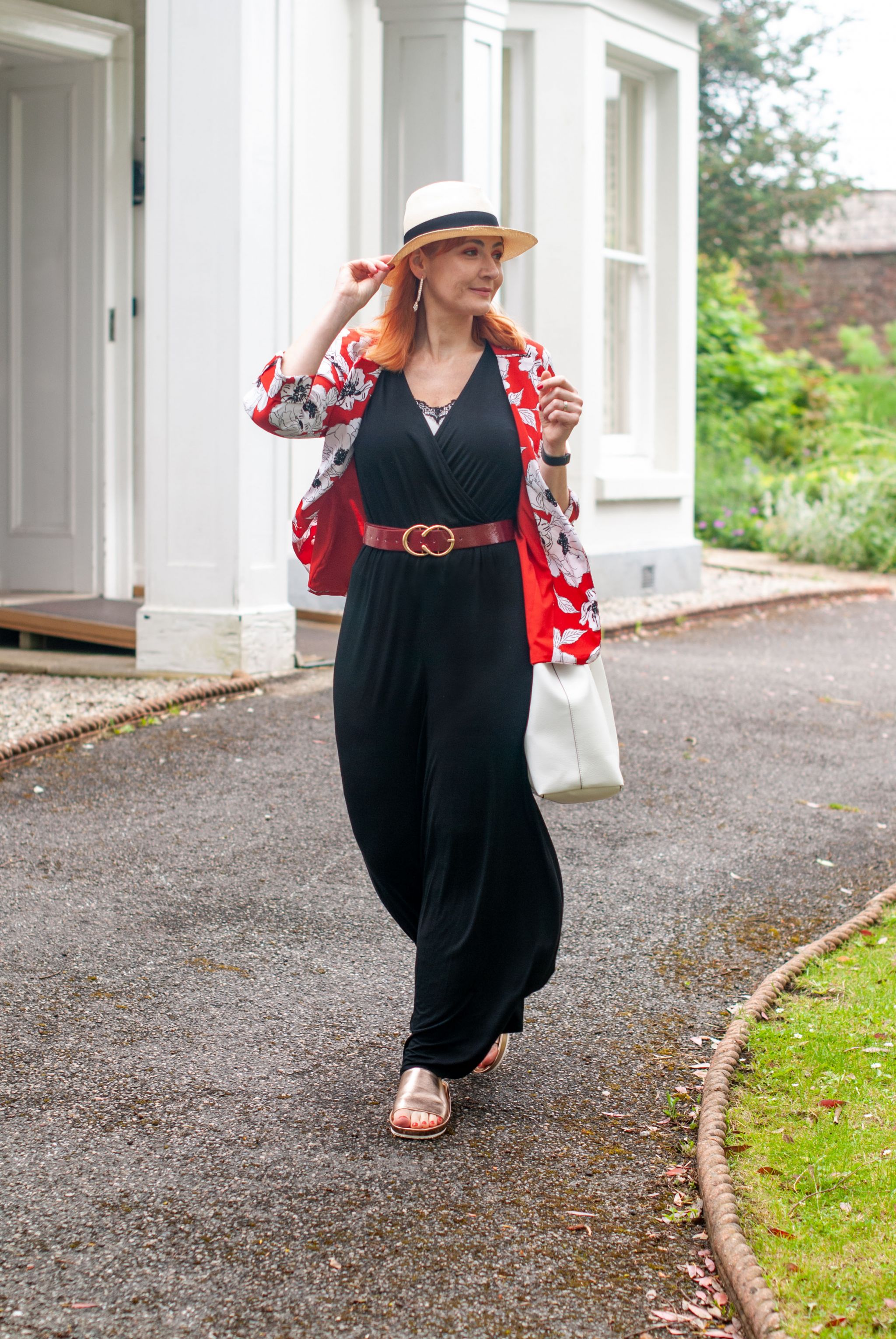 3 Ways to Wear a Black Jumpsuit - Doused in Pink